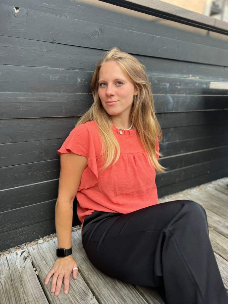 Stand out in Orange Ruffle Top