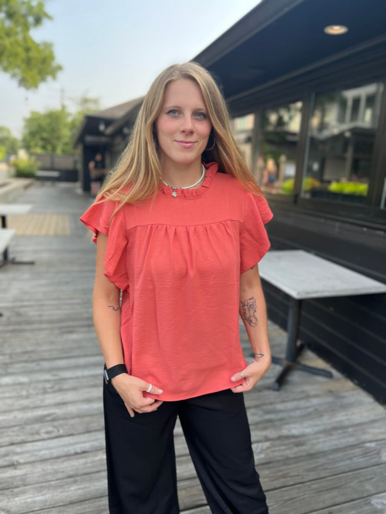 Stand out in Orange Ruffle Top
